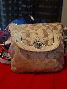Coach Beige Signature Canvas Crossbody Bag with Cream Trim.